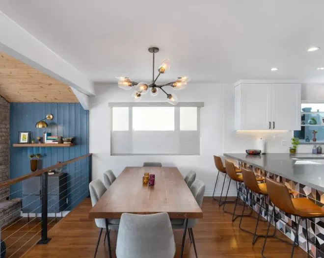 a newly remodeled elevated kitchen and dining area